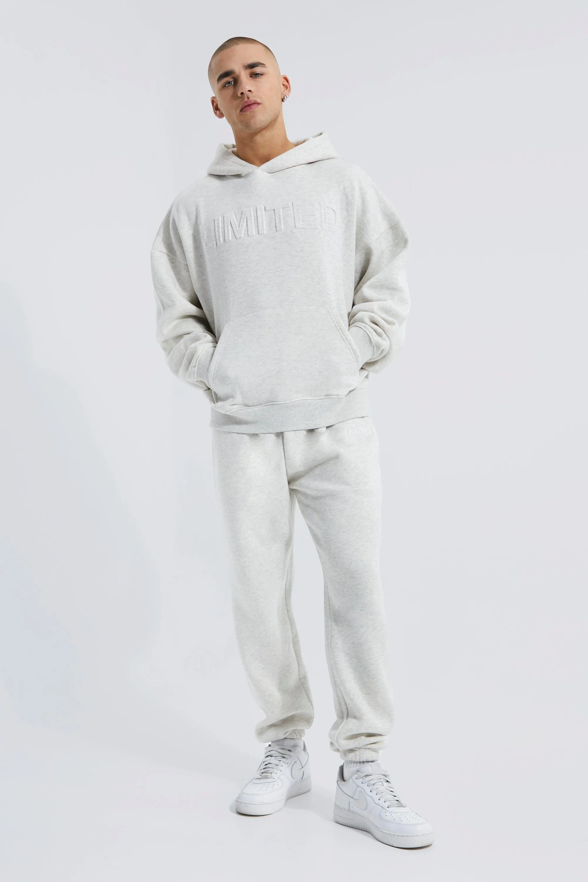 Boxy Limited Debossed Hooded Tracksuit | boohooMAN UK