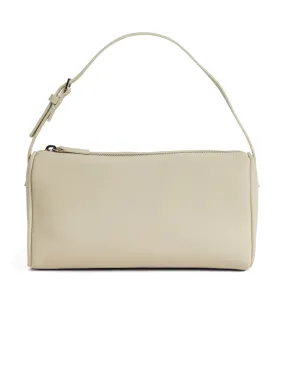 The Row 90's Leather Baguette Bag Ivory | Luxury and style at your fingertips