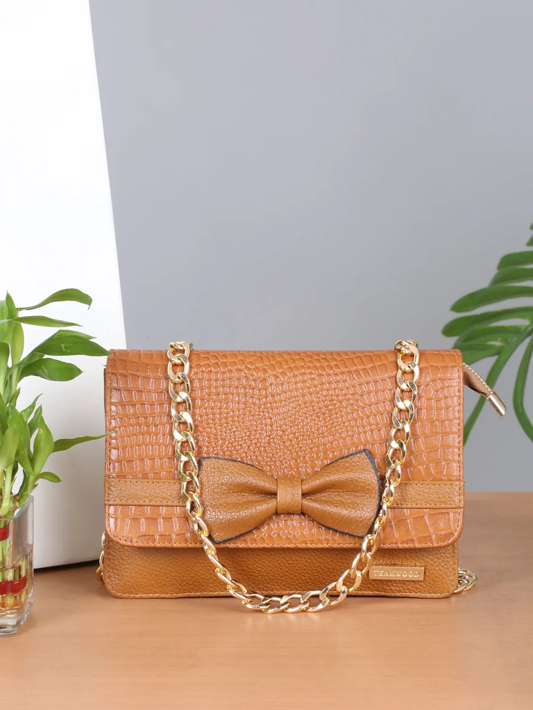 Women's textured Leather Sling Bag With Bow