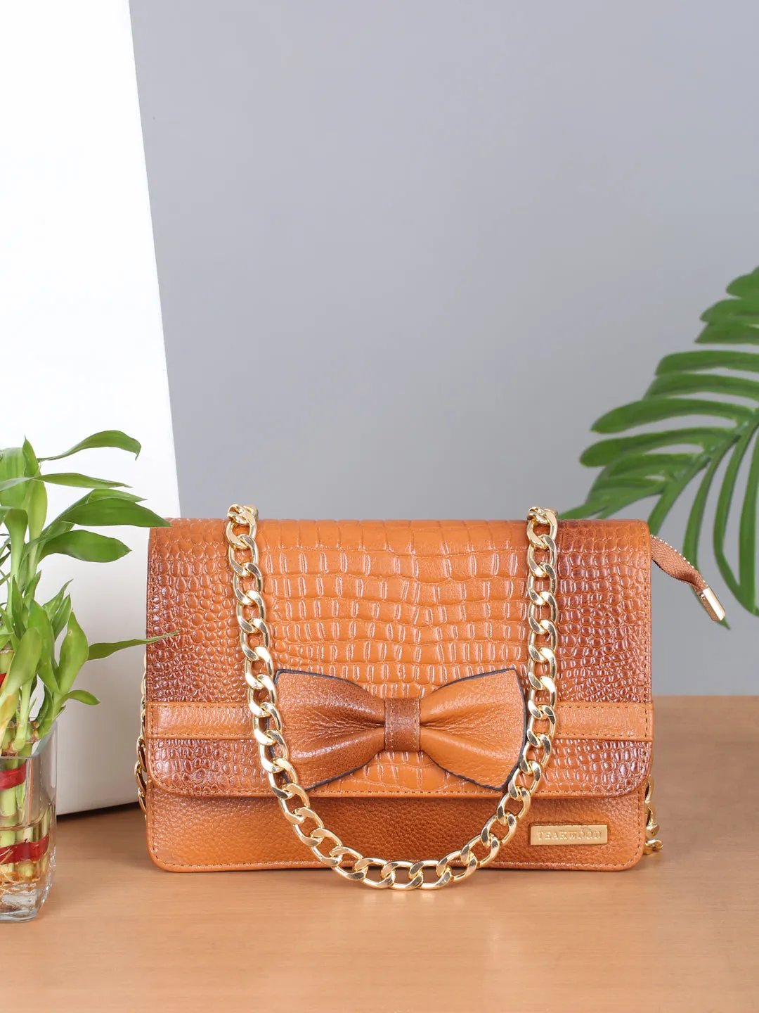 Women's textured Leather Sling Bag With Bow